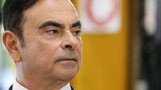 Carlos Ghosn looks on during a visit of French President at the Renault factory, in Maubeuge, northern France, on November 8, 2018