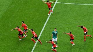 South Korea celebrate their first goal