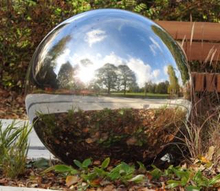 A reflective sphere sculpture