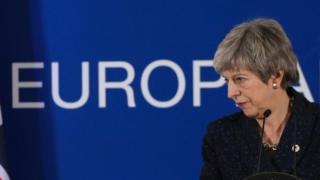 Theresa May at podium