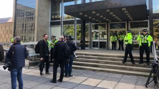 Police and press outside court
