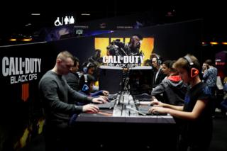 Gamers play Call of Duty: Black Ops 4 at the Paris Games Week (PGW) in 2018