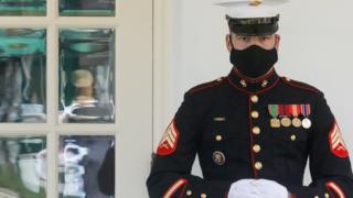 A U.S. Marine is posted at the West Wing door, an indication that President Donald Trump is in the Oval Office as he remains out of public view while fighting the coronavirus disease (COVID-19) at the White House in Washington, U.S. October 9, 2020.