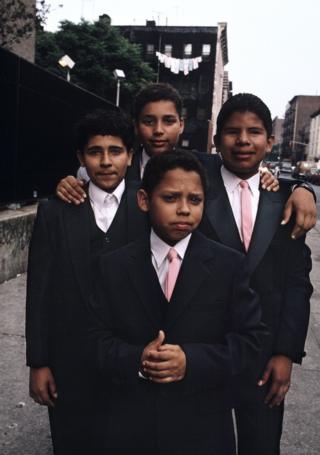 A group of young men in suits