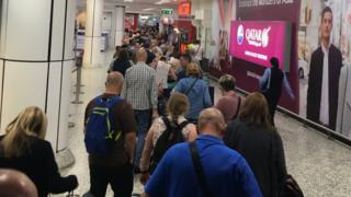 Passengers in queue