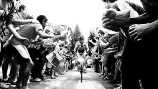   It is estimated that one million people are approaching the slopes of Alpe d'Huez to watch the cyclists pbad by. 