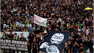 香港7個傳媒工會和組織周日(7月14日)上午發起新聞界靜默遊行