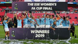Manchester City players celebrate with the Trophy after Women's FA Cup Final match between Manchester City Women and West Ham United Ladies