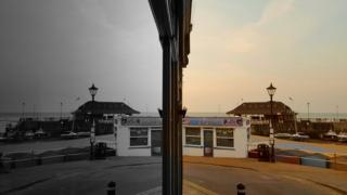 Black and white reflection in a shop window