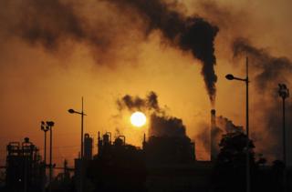 Smoke billows from chimneys at a chemical factory in Hefei, Anhui province
