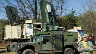 A Marine Corps vehicle with the Active Denial System on top