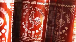 Bottles of Sriracha hot chili sauce.