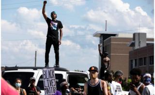 Protesters rally against the death in Minneapolis police custody of George Floyd, in Columbia, South Carolina, 30 May 2020