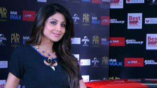 Indian Bollywood actress Shilpa Shetty poses as she attends the Indian premiere of the Hollywood film 'Fast & Furious 7' in Mumbai late April 1, 2015.