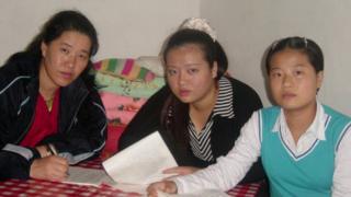 Grace Jo, her mother and older sister in China in 2004