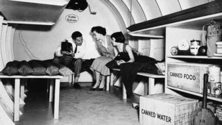 BOMB SHELTER, 1955. /nAn American family in a backyard bomb shelter, Garden City, New York, 1955