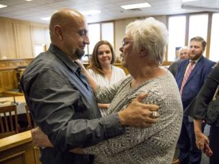 Christopher Tapp and Carol Dodge embrace