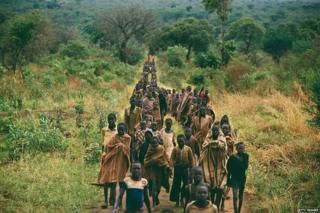Boy escaping conflict in Sudan by foot pictured in 1992