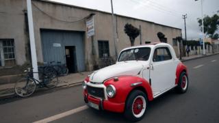 A Fiat car drives past a furniture shop in Asmara, Eritrea July 20, 2018