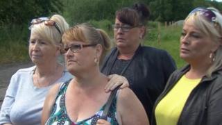 Philomena McKee (second left) and family members at the scene in County Meath