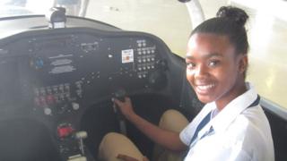 South African student Agnes Keamogetswe Seemela, 15, sitting in a plane