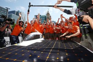 The Nuon Solar Team of the Netherlands celebrates after winning the 2015 Bridgestone World Solar Challenge at Victoria Square on 22 October 2015 in Adelaide, Australia