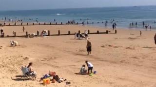 Beachgoers at Frinton beach.