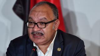 Papua New Guinea's Prime Minister Peter O'Neill speaks during the Asia-Pacific Economic Cooperation (APEC) Summit in Port Moresby in November 2018