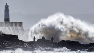 Waves crash against the harbour wall during Storm Gareth on 13 March at Porthcawl, Wales