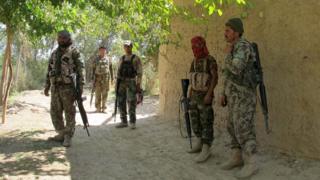 Afghan security forces arrive to fight with Taliban forces in Helmand, Afghanistan October 21, 2015.