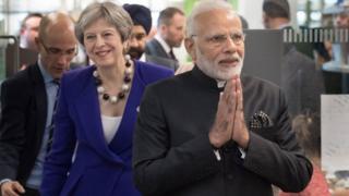 મોદી તથા ટેરિઝા મેની તસવીર