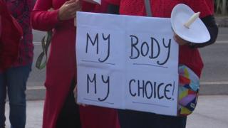 'My body my choice' banner