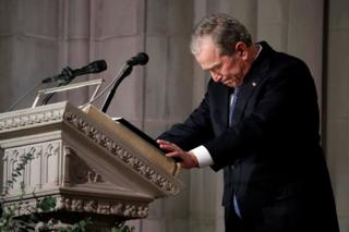 Former President George W Bush speaks at the state funeral for his father, former President George HW Bush