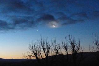 Rising Venus, the Moon and Mercury from the Isle of Skye.