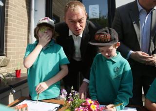 Liberal Democrats leader Tim Farron joins pupils for a gardening class during his visit to Lewannick Primary School in Cornwall, where he unveiled the party's landmark education funding policy. 10 May 2017.