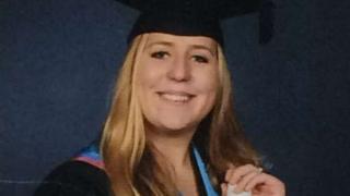 Katie Locke in her graduation gown