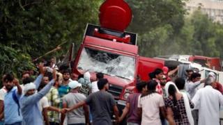 Crowds smashed television trucks in Panchkula after the verdict