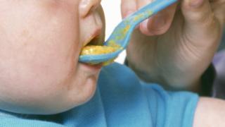 A baby being fed (file photo)