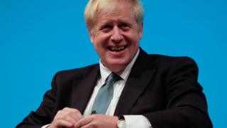 A smiling Boris Johnson