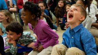 A group of children laughing