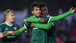 Gerardo Bruna celebrates with Ciaron Harkin and Junior Ogedi-Uzokwe