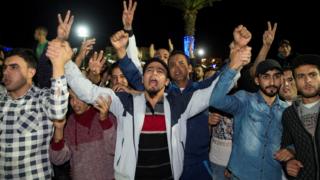 Protesters chanting in the street in the northern Moroccan city of Al-Hoceima after the death of a fishmonger - October 2016
