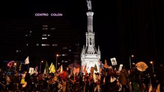 Demonstrators take part in a mass climate march