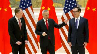 (From L) US Trade Representative Robert Lighthizer, Chinese Vice Premier and lead trade negotiator Liu He and US Treasury Secretary Steven Mnuchin talk before the opening session of trade negotiations at the Diaoyutai State Guesthouse in Beijing on February 14, 2019