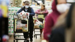 shoppers wearing masks