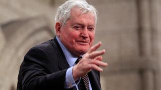 Former Canadian Prime Minister John Turner gestures in Ottawa on 23 June 2011