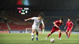 South Korea v North Korea match in front of empty stadium