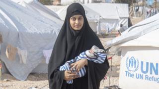 PERMISSION ONLY TO USE FOR 24 HOURS AFTER 22:00 ON 8/03/19. Shamima Begum with her week old son Jerrah