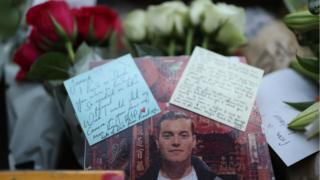Floral tributes for victims of the terrorist attack, including Jack Merritt, left on London Bridge in central London