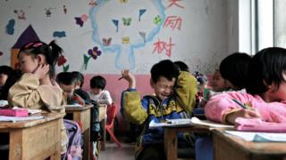 Young Chinese children attend a kindergarten